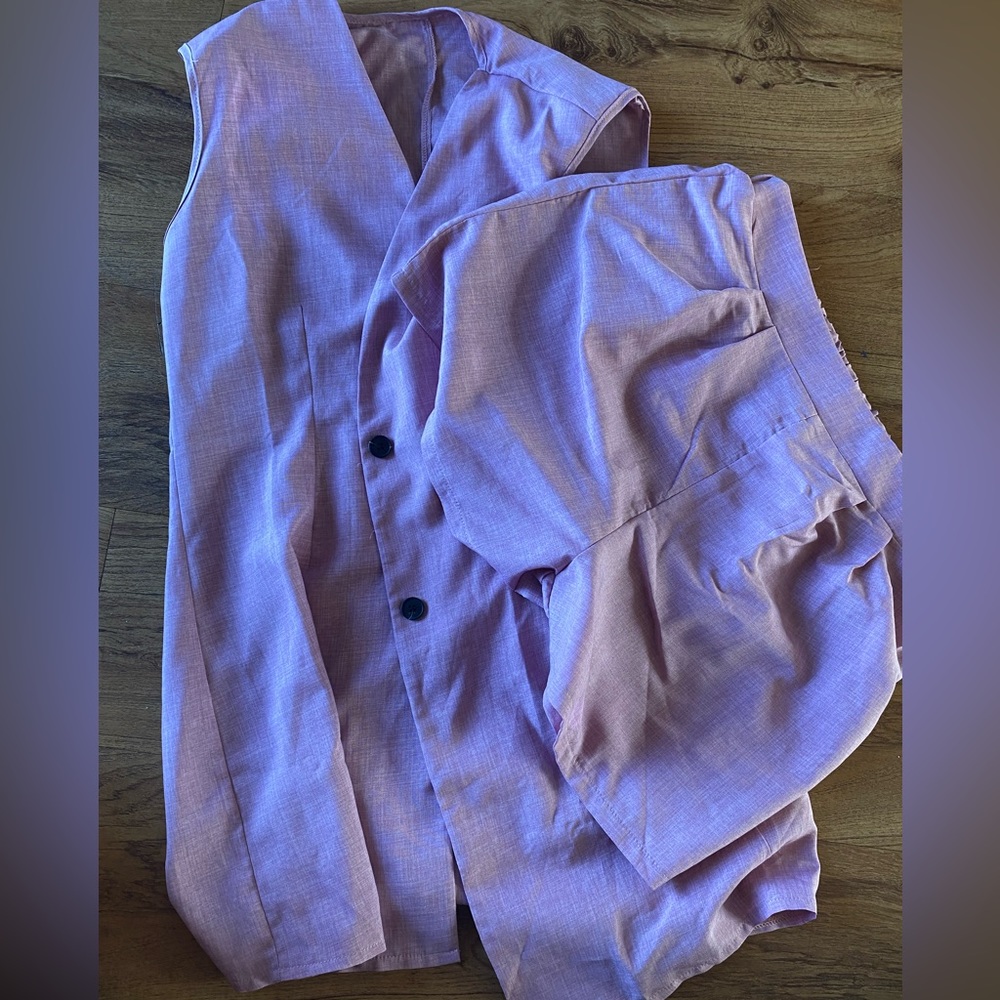 Pink shorts and vest set.